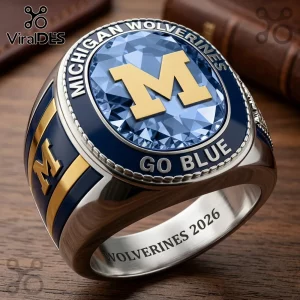 Michigan Wolverines championship ring with blue gem and gold M logo featuring Go Blue and Wolverines 2026 text!