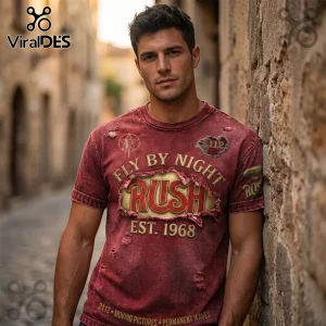 Distressed maroon band t-shirt featuring RUSH Fly By Night logo with 2112 and Est 1968 text in a graphic rock style!