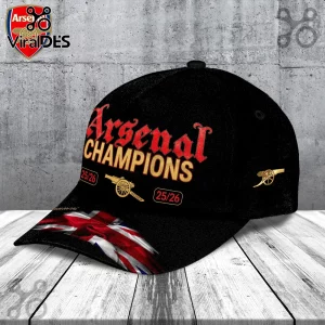 Black baseball cap featuring Arsenal Champions 25/26 text, cannon graphic, and Union Jack flag on the brim!