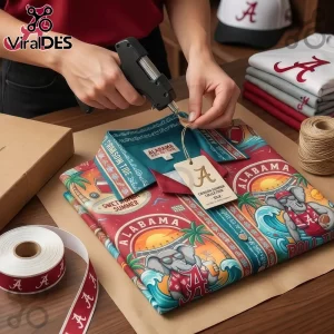 Folded Alabama Crimson Tide themed button up shirt with tropical elephant graphics and sunset beach print!
