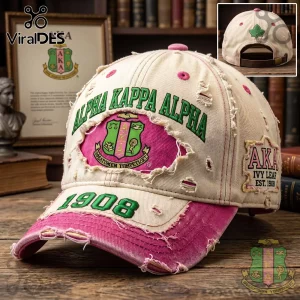 Distressed cream and pink Alpha Kappa Alpha baseball cap with green embroidered text and 1908 logo patch!