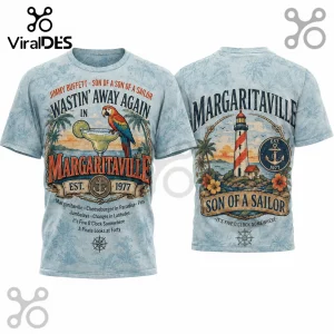 Light blue t-shirt with Jimmy Buffett Margaritaville graphics featuring a parrot, margarita, lighthouse, and anchor text!