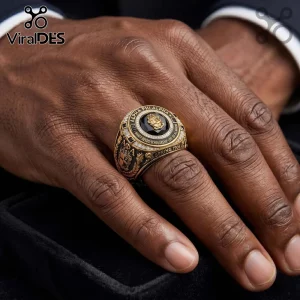Ornate gold and black fraternity signet ring with white stones, text ALPHA PHI ALPHA AΦA MANLY DEEDS SCHOLARSHIP LOVE FOR ALL MANKIND SPRING 1906!