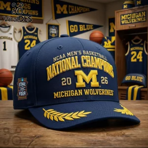 Navy blue baseball cap with yellow embroidery saying 2026 Michigan Wolverines NCAA National Champions and Final Four logo!