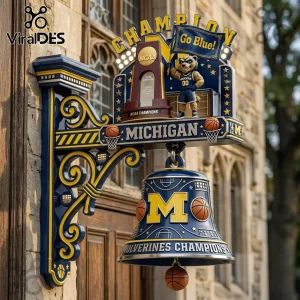 Wall-mounted Michigan Wolverines basketball championship bell sign in blue and gold with NCAA trophy and Go Blue flag!