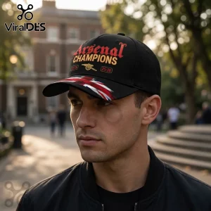 Black baseball cap with Arsenal Champions 25/26 text, cannon logo, and British flag detail on the brim!