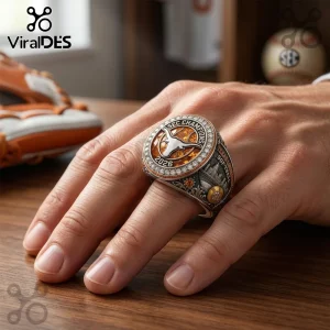Ornate silver championship ring with orange gem, white stones, Texas Longhorns logo, 'SEC CHAMPIONS 2026', 'TEXAS LONGHORNS SOFTBALL' text!