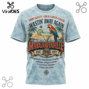 Light blue t-shirt with Jimmy Buffett Margaritaville graphic, parrot, margarita glass, and tropical palm tree design!