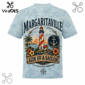 Light blue t-shirt featuring Margaritaville lighthouse, anchor, tropical flowers, and Son of a Sailor text in retro style!
