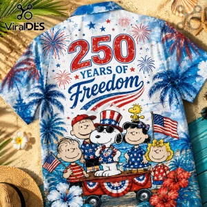 Peanuts characters with US flags and fireworks on a tropical red white and blue hawaiian shirt reading 250 Years of Freedom!