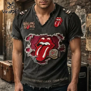 Distressed black Rolling Stones t-shirt with red tongue logo and vintage rock band typography graphics!