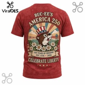 Red shirt with Buc-ee's America 250 patriotic beaver graphic wearing a star-spangled hat with floral accents!
