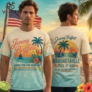 Cream and teal Jimmy Buffett t-shirt with tropical sunset, palm tree, parrot, and Margaritaville text graphics!