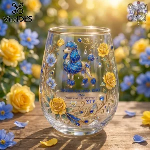 Stemless wine glass with blue poodle, yellow roses, and Sigma Gamma Rho 1922 text on a wood background.!