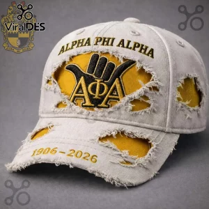 Distressed light gray cap with yellow backing, black and yellow AΦA hand design, 'ALPHA PHI ALPHA', '1906-2026' embroidery!