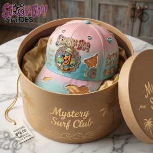 Pastel pink and blue Scooby-Doo baseball cap with rhinestone accents and Mystery Surf Club text inside a gift box!