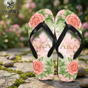 AKA sorority flip-flops with pink roses, green ivy, and pearl accents on a soft pink background with black rubber straps!