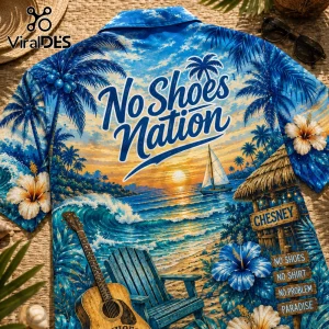 Blue tropical print button-up shirt featuring a beach sunset, guitar, hibiscus flowers, and No Shoes Nation text!
