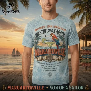 Light blue tropical patterned t-shirt with parrot, margarita, and Margaritaville text graphics!
