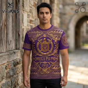 Purple t-shirt with gold Greek key trim, shield emblem, and text Omega Psi Phi 1911 in an ornate metallic 3D style!