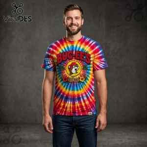 Man wearing a bright multi-colored tie-dye t-shirt with Bug-ee's logo and beaver graphic with tropical flowers!