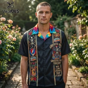 Black button down shirt featuring Grateful Dead graphics, skeleton artwork, tie dye collar, and Truckin lyrics design!