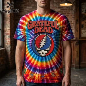 Multicolor tie dye t-shirt featuring Grateful Dead logo and dancing bears graphics on a brick background!