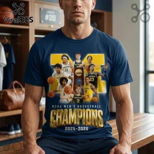 Navy blue t-shirt featuring a Michigan basketball team collage with gold trophy and text NCAA Mens Basketball Champions!