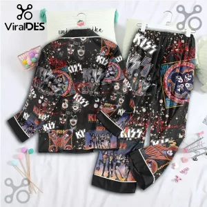 KISS band pajama set featuring black fabric with all-over vintage concert graphics, band member portraits, and logos.!