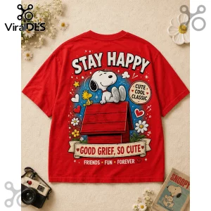 Red cotton t-shirt featuring Snoopy on a red doghouse with text STAY HAPPY, GOOD GRIEF, SO CUTE and Woodstock illustration.!