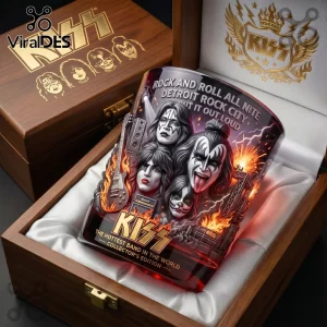 KISS band whiskey glass with band members, flames, and text in a lined wooden display box with gold branding.!