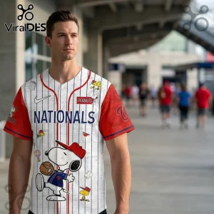 Washington Nationals baseball jersey featuring Snoopy wearing a red cap and glove with pinstripes and Peanuts character art.!