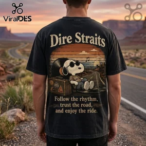 Black vintage-wash t-shirt with Snoopy sitting on a vinyl record, suitcase, desert road background, and Dire Straits text.!