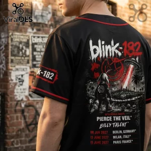 Black Blink-182 baseball jersey with red trim, featuring a graphic of an alien and UFO over a city skyline.!