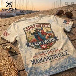 Vintage beige crewneck t-shirt featuring a parrot graphic, Jimmy Buffett text, and tropical motifs on a wooden dock.!