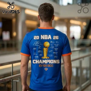 Blue and orange New York Knicks jersey featuring a 2026 NBA championship trophy graphic with player signatures on the back.!
