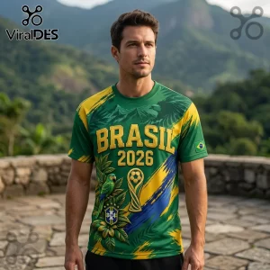Man wearing green Brazil 2026 soccer jersey featuring a parrot, gold trophy graphic, and CBF crest on a stone patio.!