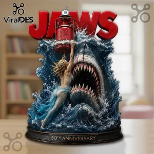 Jaws 50th Anniversary collectible resin statue featuring a great white shark and swimmer with a red Amity Island buoy.!