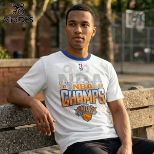 White crew neck t-shirt featuring 2026 NBA Champs graphic and New York Knicks logo on a man sitting on a park bench.!