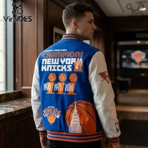 Blue and white varsity jacket featuring New York Knicks 1970, 1973, and 2026 championship graphics and team logo.!