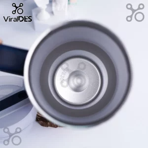 Top-down view of a stainless steel vacuum insulated tumbler interior with SUS304 embossed on the bottom base.!