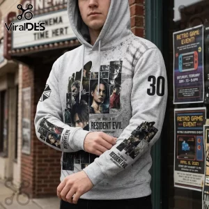 Light grey Resident Evil 30th anniversary hoodie featuring a collage of game characters and the Umbrella Corporation logo.!