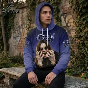 Man wearing a blue hooded sweatshirt featuring a large graphic print of Ozzy Osbourne with text logo and white drawstrings.!