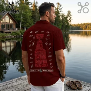 Maroon button-up shirt featuring printed NHL player names and signatures with 2026 Stanley Cup Champions text on back.!
