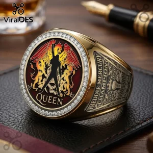 Gold Queen band commemorative ring featuring Freddie Mercury silhouette, red enamel inlay, and paved diamond-look border.!