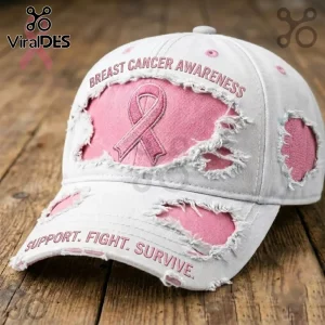 Distressed white baseball cap with pink fabric underlay, embroidered breast cancer ribbon, and text Support. Fight. Survive.!
