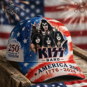 KISS band baseball cap featuring American flag pattern, 250 years of freedom text, and 1776-2026 date on wooden surface.!