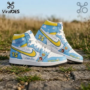 Custom high-top sneakers with light blue cloud pattern, yellow swooshes, Toy Story 5 branding, and Taylor Swift graphics.!