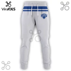New York Knicks basketball sweatpants in light grey with a blue stripe waistband and white drawstring ties.!