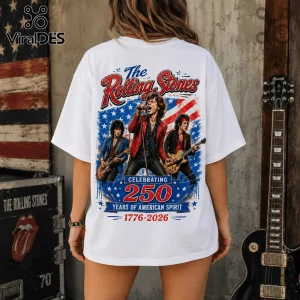 White oversized t-shirt featuring The Rolling Stones band members, American flag graphics, and 1776-2026 anniversary text.!